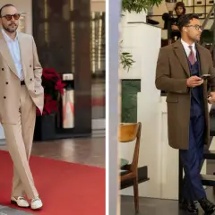 Zwei Männer in eleganten Anzügen. Der linke trägt einen beigen Anzug, der rechte einen dunkelblauen mit braunem Mantel. So muss eine Anzughose sitzen: gerade und ohne Falten.