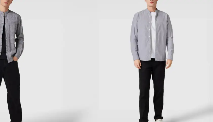 Zwei Männer präsentieren, wie man ein graues Hemd kombinieren kann: lässig mit schwarzer Jeans und Sneakern.