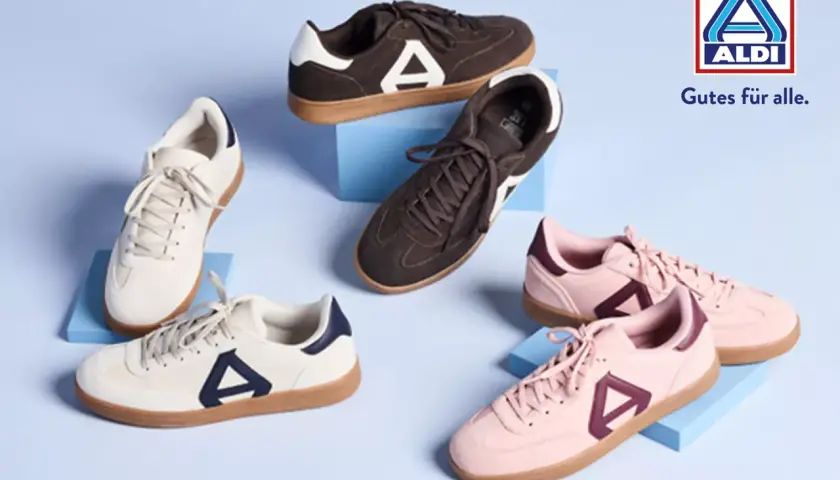 Sneaker Trend Damen: Weiße, braune und rosafarbene Retro-Sneaker mit Gummi-Sohle und markantem Logo.