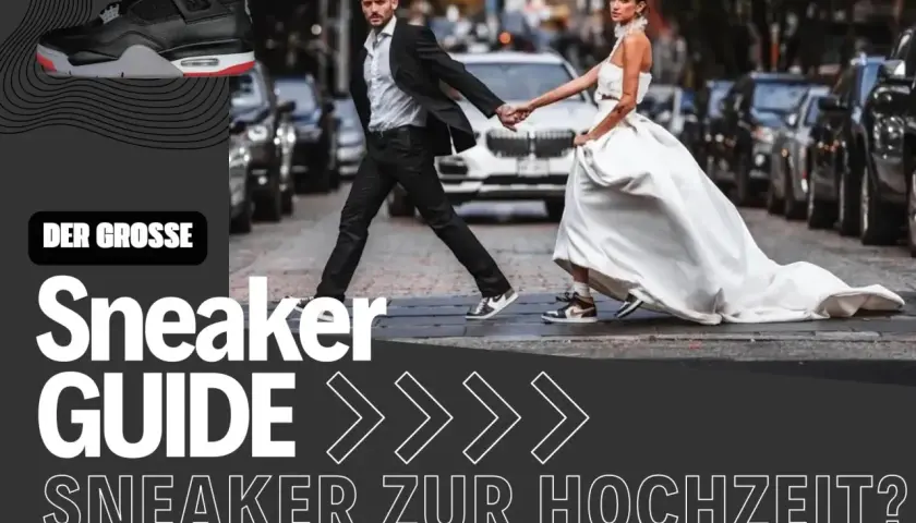 Brautpaar überquert Straße, sie im weißen Kleid, er im Anzug mit Sneaker. Hochzeit mit Sneaker?