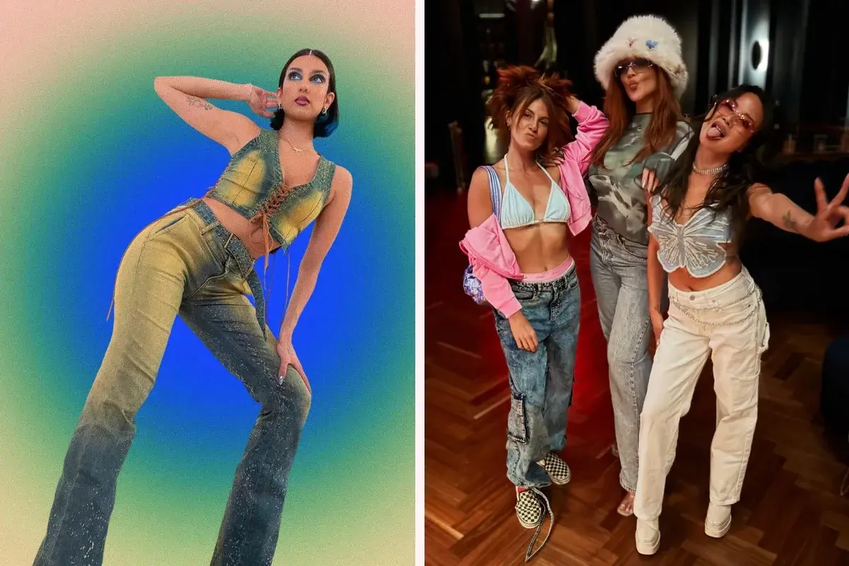 Drei Frauen in stylischen Outfits für eine 2000er Mottoparty: Jeans-Westen, bauchfreie Tops und Baggy-Hosen.
