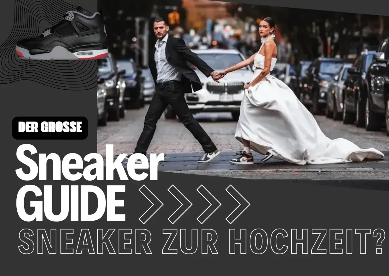 Brautpaar überquert Straße, sie im weißen Kleid, er im Anzug mit Sneaker. Hochzeit mit Sneaker?