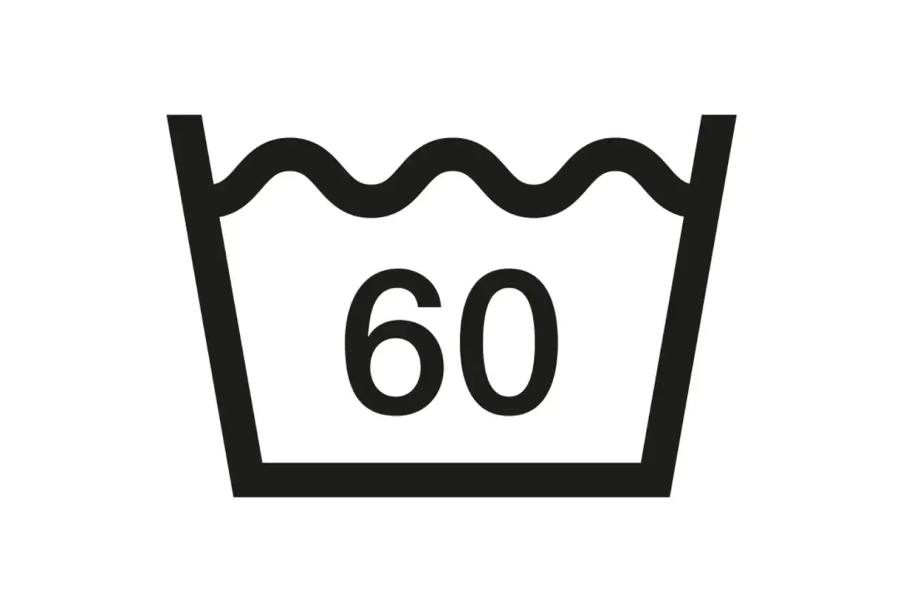 Waschanleitung: Leinen bei 60 Grad waschen. Das Symbol zeigt eine Waschsch&uuml;ssel mit Wellen und der Zahl 60.